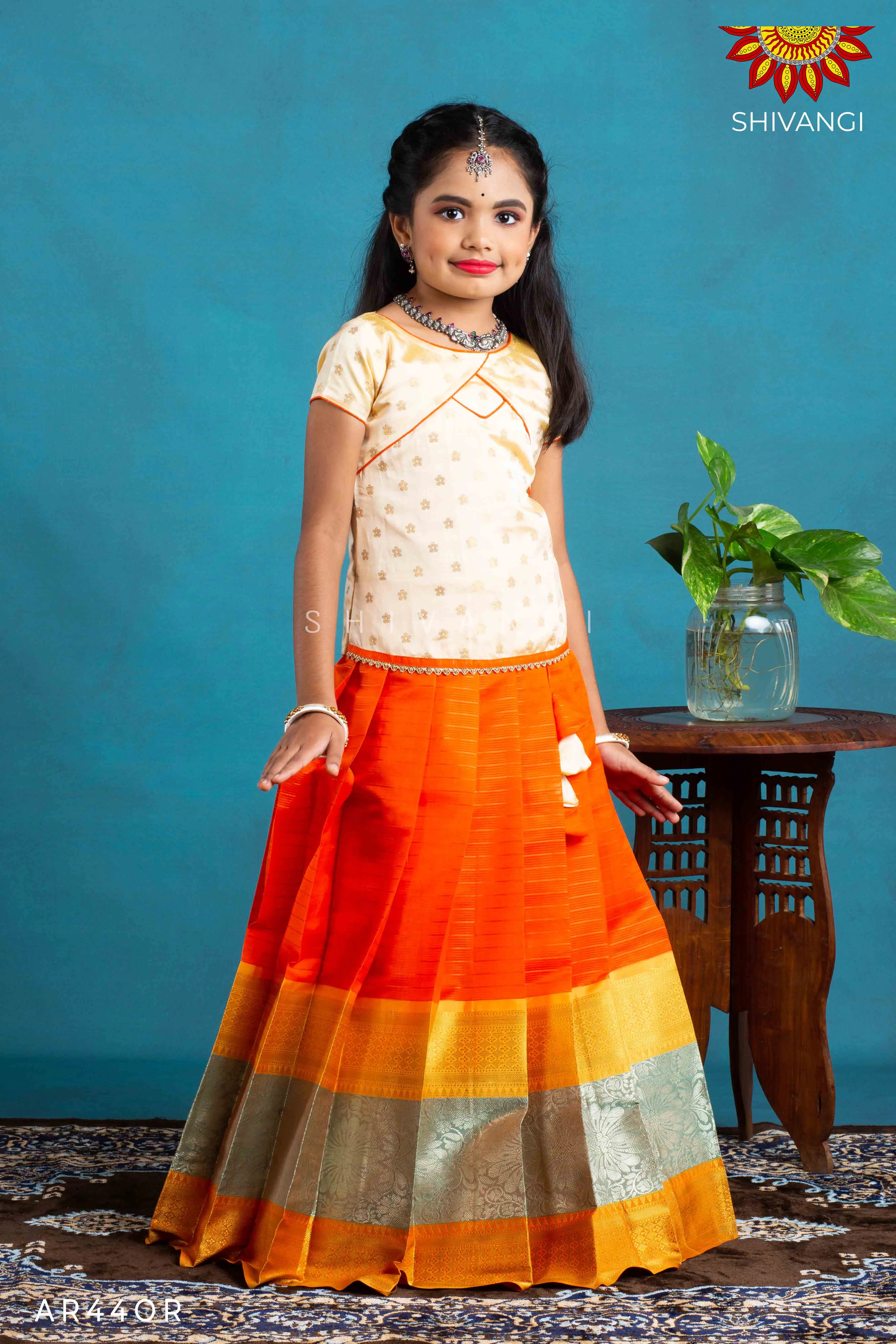 Girls Orange Floral Spring Pattu Pavadai